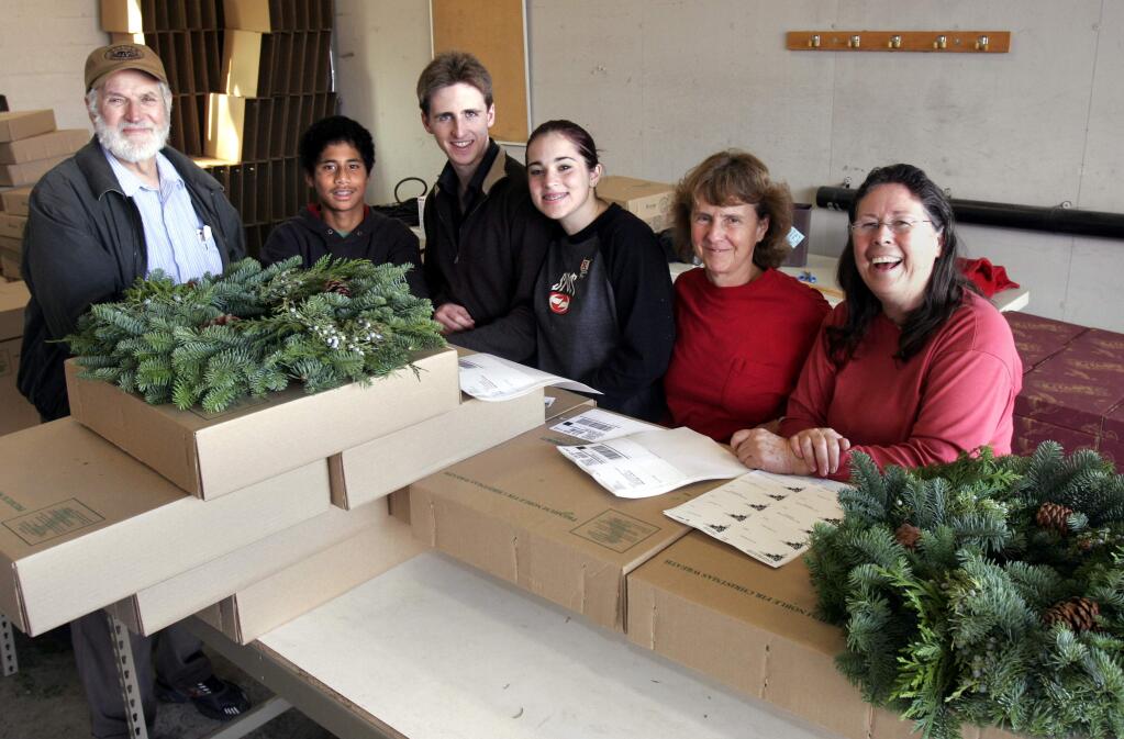 The Starcross family at the Rohnert Park warehouse for their Christmas wreath business. From left, Brother Toby McCarroll , Andrew, David, Holly, Sister Julie and Sister Marti. (PD FILE, 2005)