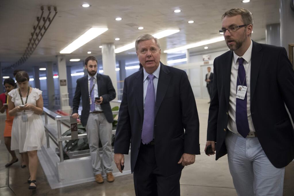 Sen. Lindsey Graham, R-S.C., arrives at the Senate for final votes of the week on the day after Sen. John McCain, R-Ariz., was diagnosed with an aggressive type of brain cancer, on Capitol Hill in Washington, Thursday, July 20, 2017. Sen. Graham, McCain's closest friend in the Senate, said that they had spoken by telephone Wednesday night and that the diagnosis had been a shock to McCain. 'John has never been afraid of is death,' said Graham, of McCain, 80, a Vietnam veteran and former prisoner of war. (AP Photo/J. Scott Applewhite)