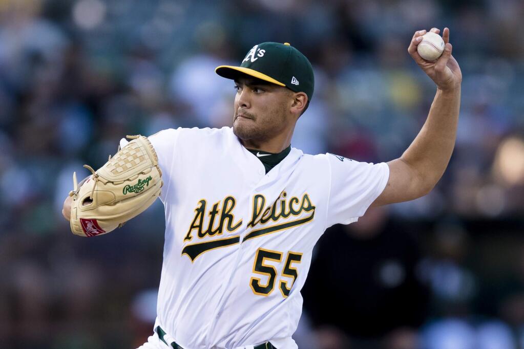 Oakland Athletics starting pitcher Sean Manaea throws to a Boston Red Sox batter during the first inning in Oakland, Saturday, April 21, 2018. (AP Photo/John Hefti)