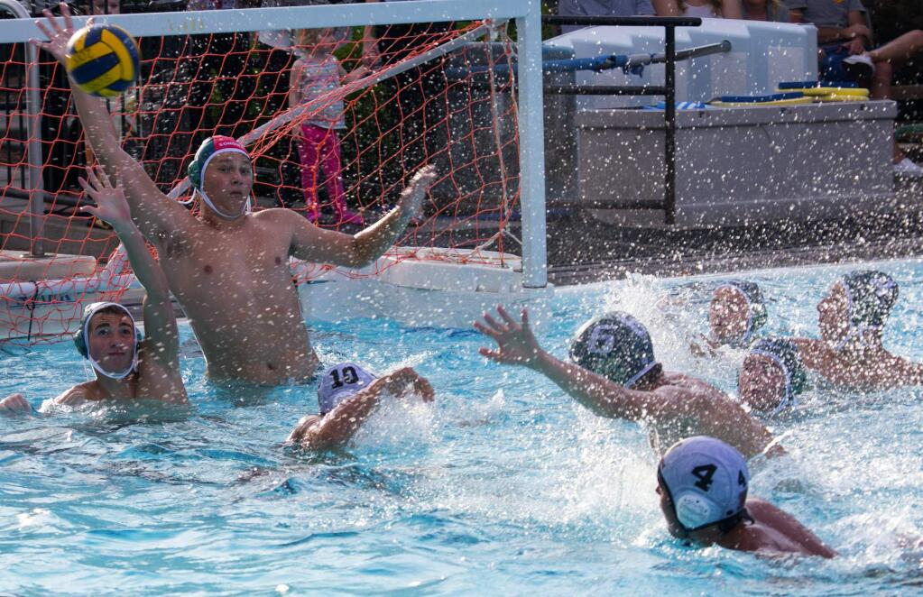 Julie Vader/Special to the Index-TribuneSonoma goalie Cameron Baker makes a save during a recent match. The Dragon water polo boys beat San Rafael 8-7 on Thursday. Both the boys and girls will host Cardinal Newman Thursday at the Sonoma Aquatic Center.