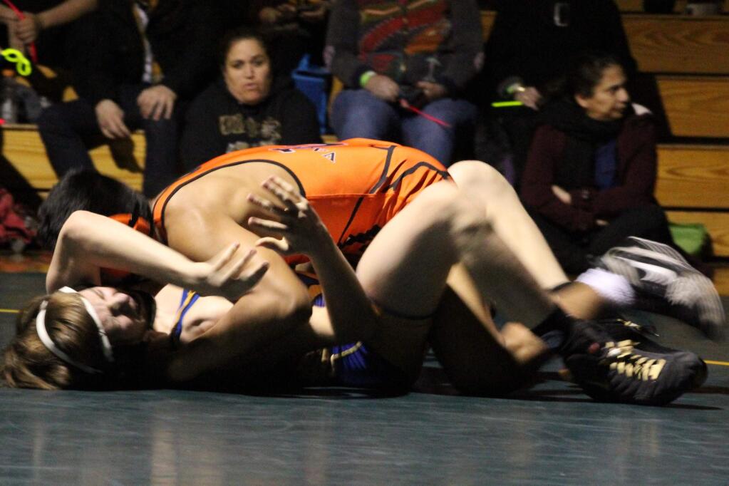 Vacaville High School's Jacob Peralta attempts to pin Sutter Union High School's Brady Thornton in the 132-pound weight class final match at the Pumas Classic on Saturday, Jan. 19, 2019. Peralta won, helping his school claim first place in the tournament, and was awarded the lower-class MVP. (Albert Gregory / for The Press Democrat)