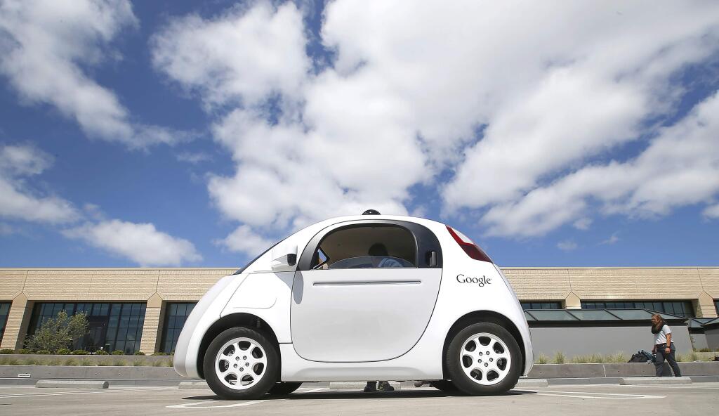 One of Google's self-driving cars is seen during a demonstration at the Google campus in Mountain View. (TONY AVELAR / Associated Press)