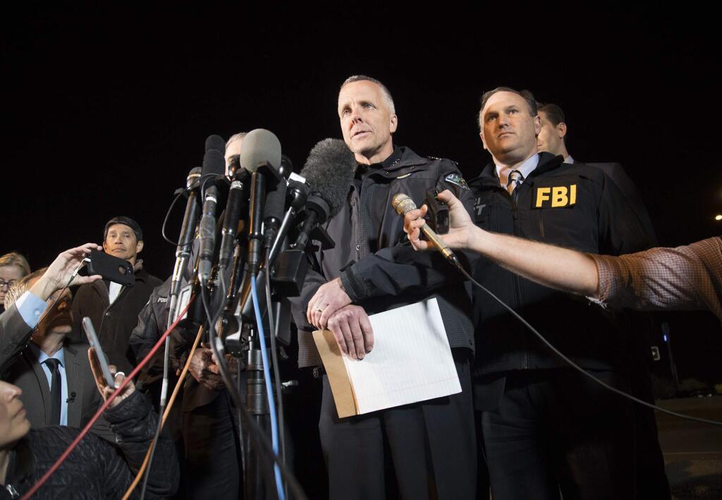 Austin Police Chief Brian Manley briefs the media, Wednesday, March 21, 2018, in Round Rock, Texas. The suspect in a spate of bombing attacks that have terrorized Austin over the past month blew himself up with an explosive device as authorities closed in, the police said early Wednesday. (Ricardo B. Brazziell/Austin American-Statesman via AP)