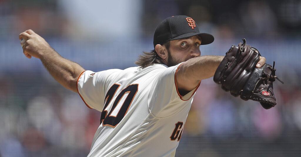 San Francisco Giants pitcher Madison Bumgarner works against the Atlanta Braves in the first inning of a baseball game Thursday, May 23, 2019, in San Francisco. (AP Photo/Ben Margot)