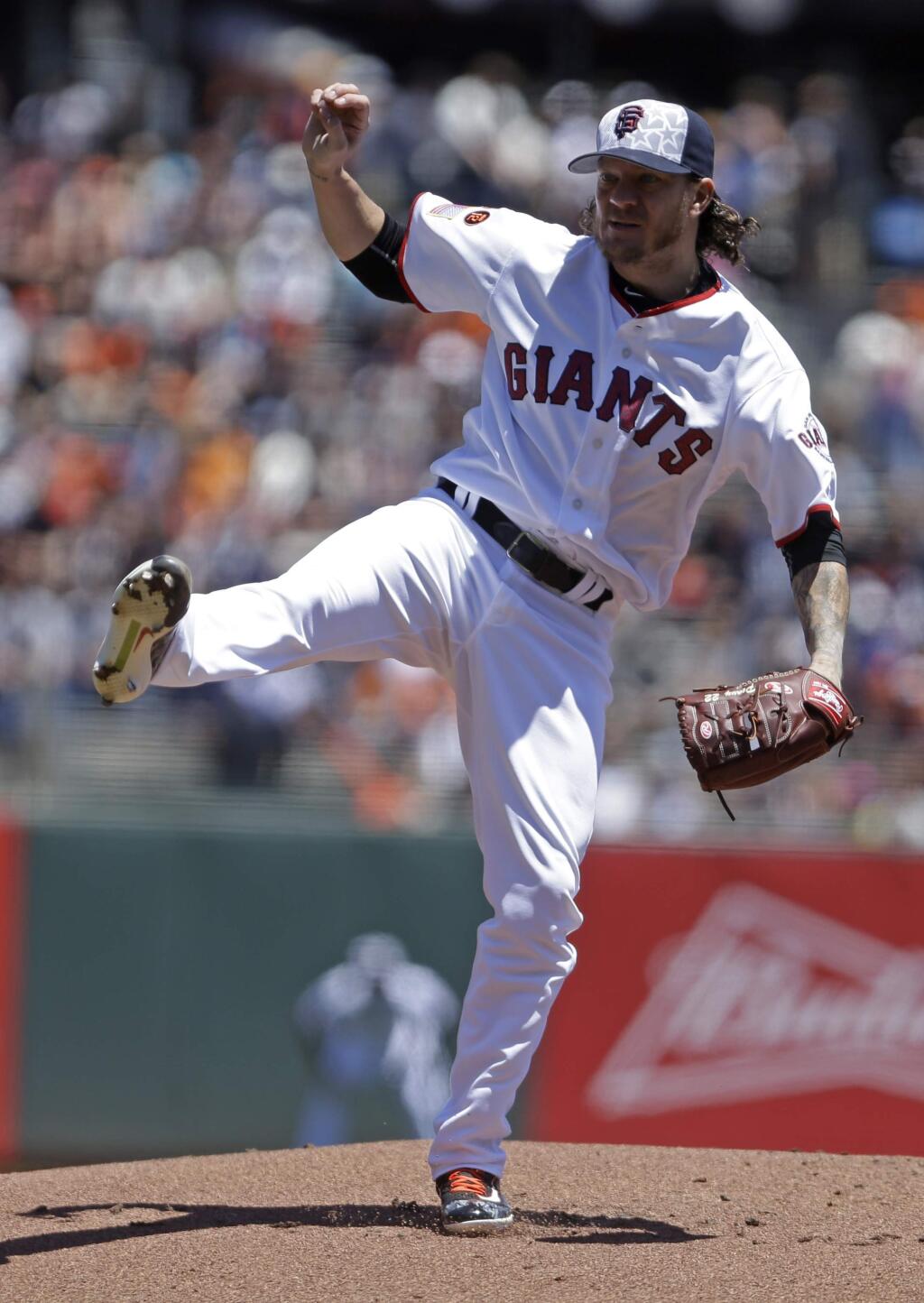 San Francisco Giants pitcher Jake Peavy works against the Colorado Rockies in the first inning of a baseball game Monday, July 4, 2016, in San Francisco. (AP Photo/Ben Margot)