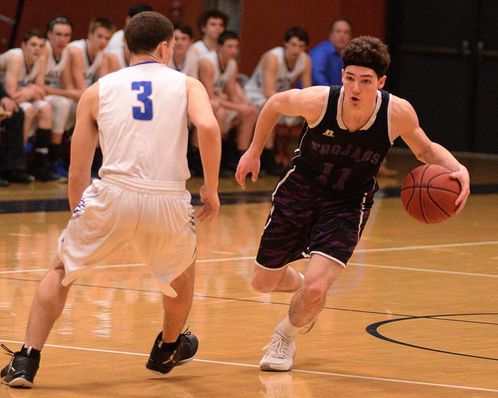 SUMNER FOWLER/FOR THE ARGUS-COURIERPetaluma's Brendan O'Neill provided not only ball handling on offense for the Trojans, but was also the SCL's Co-Defensive Most Valuable Player.