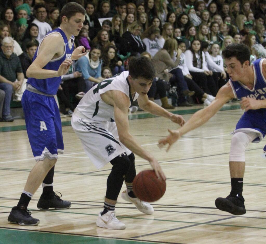 Bill Hoban/Index-TribuneSonoma's Dylan Samaniego looks to shake a couple of Analy defenders during a recent game. The Dragons received a #13 seed in the North Coast Section Tournament that starts today, Tuesday, Feb. 21. The Dragons will be on the road against fourth-seeded San Marin.