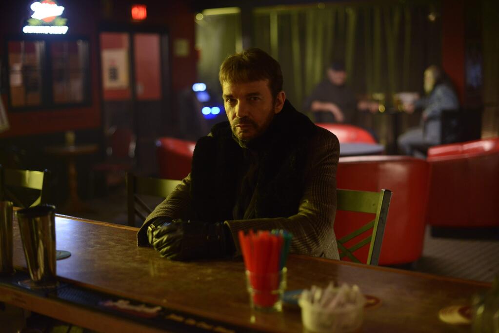 This image released by FX shows Billy Bob Thornton as Lorne Malvo in a scene from 'Fargo.' (AP Photo/FX, Chris Large)