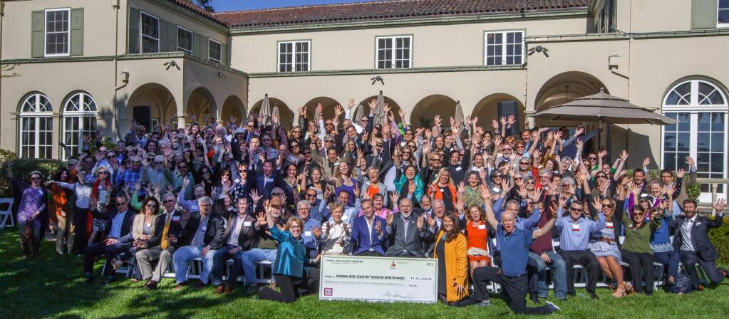 Robbi Pengelly/Index-Tribune A show of hands More than 200 Sonoma County wine industry supporters raised their hands at Chateau St. Jean in Kenwood March 31, in celebration of the record-breaking take from the 2015 Sonoma Wine Country Weekend – a glass shattering $3,487,000, all headed toward local nonprofits. Nearly $2 million of that was raised for the Fund the Future initiative to promote children's literacy programs, with another $1.5 million disbursed to a whopping 81 charitable groups. Kenneth Juhasz, president of the Sonoma Valley Vintners and Growers Alliance, partly credited the “rise in leadership” within the county wine industry as helping harvest such unprecedented fundraising. While Dan Goldfield, president of the Sonoma County Vintners Foundation, expressed his “pleasure to be part of something larger than ourselves.” With the 2015 totals in the tally, Wine Country Weekend has over the years invested more than $20 million in local nonprofits. – Jason Walsh