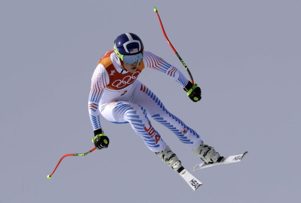 United States' Lindsey Vonn jumps while competing in the women's downhill at the 2018 Winter Olympics in Jeongseon, South Korea, Wednesday, Feb. 21, 2018. (AP Photo/Luca Bruno)