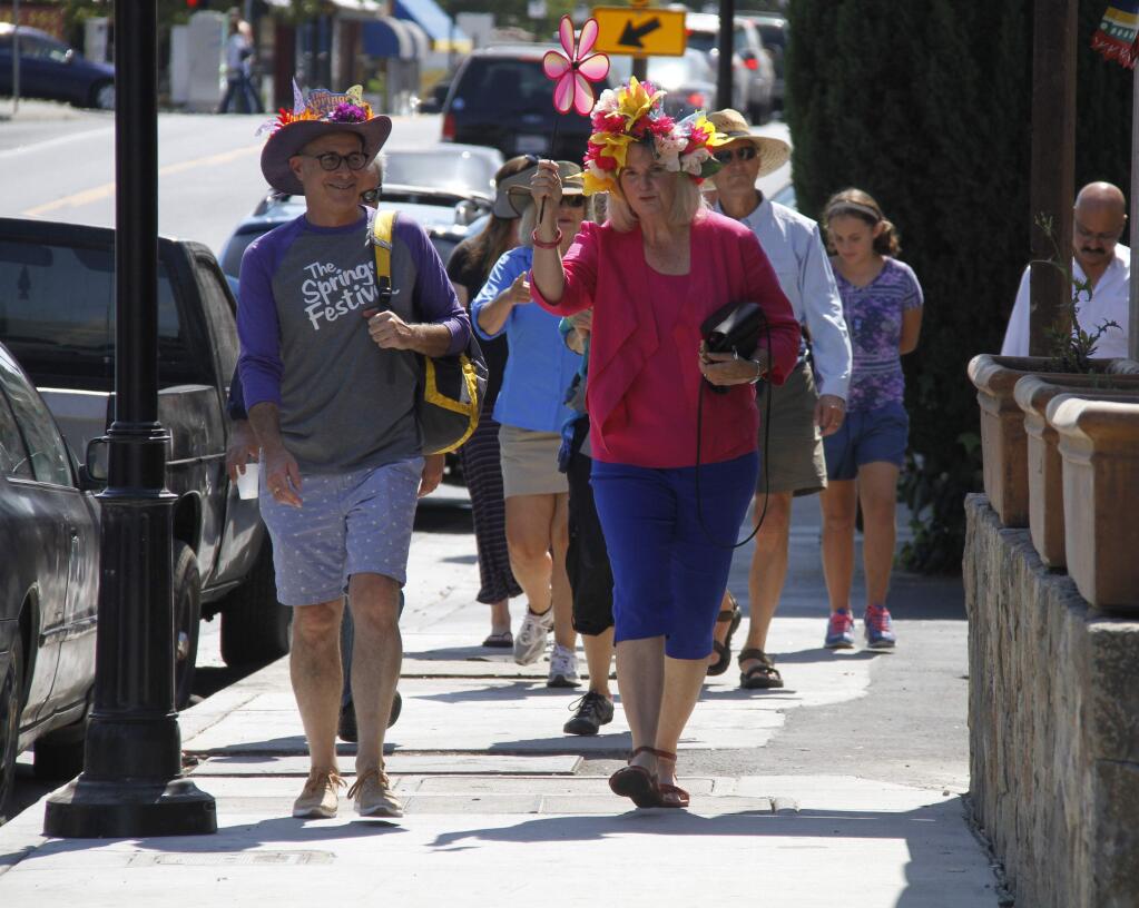 Supervisor Susan Gorin leads a procession of Springs community members to the inaugural Springs Festival last year at Larson Park. The supervisors last week cleared a path for residents of unincorporated county neighborhoods to form local councils to help steer the vision of their communities.