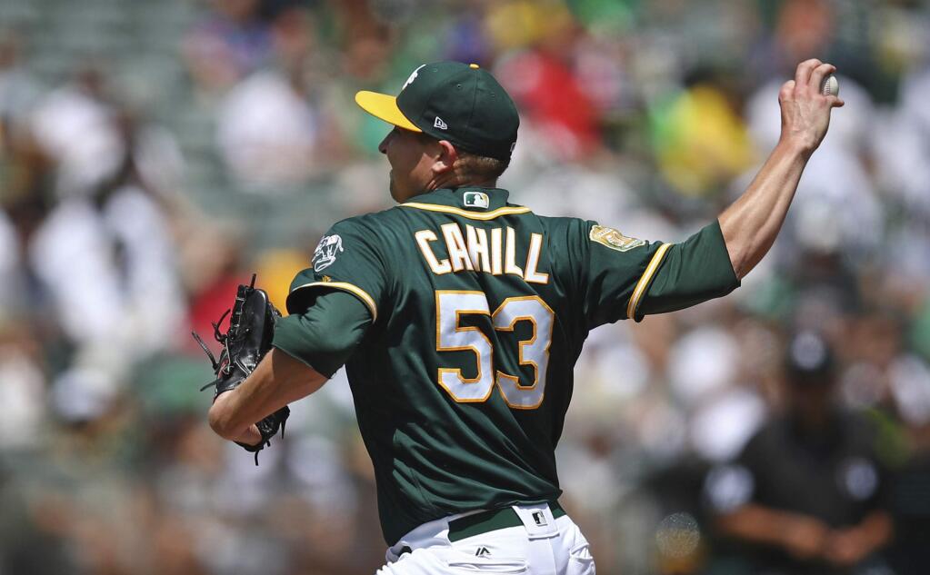 Oakland Athletics pitcher Trevor Cahill works against the Houston Astros in the first inning Saturday, Aug. 18, 2018, in Oakland. (AP Photo/Ben Margot)