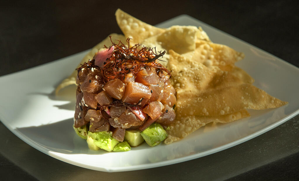 Ahi Tuna Poke with avocado and radishes complement our wine of the week, a young rosé. (John Burgess / The Press Democrat)