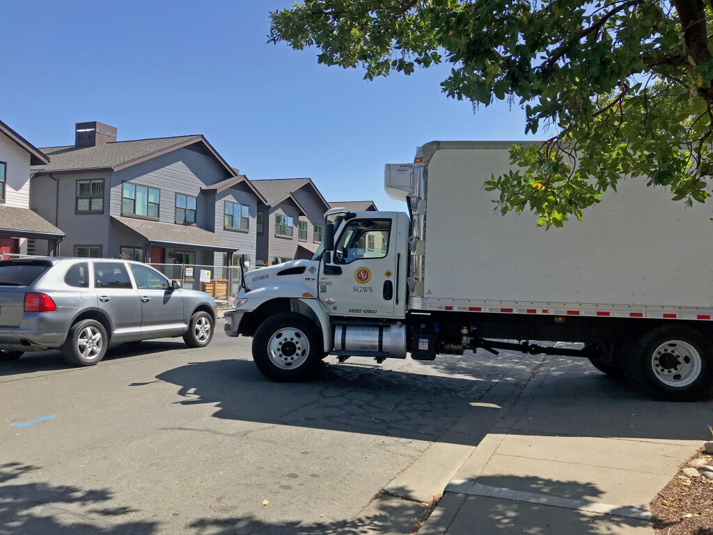 A truck making deliveries to the Lodge at Sonoma is parked on the sidewalk and extending into Clay Street, in this recent photo. Neighbors have long complained that the Lodge does not have a proper loading dock for such deliveries. (Lynn Fiske Watts)