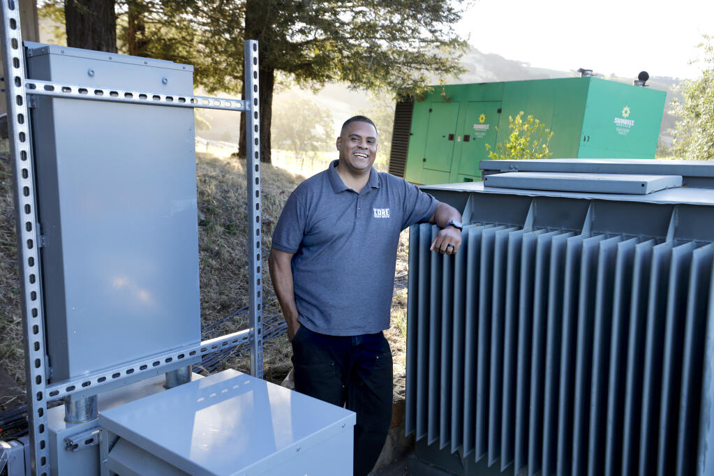 Chris Perez, owner of Core Electrical Services, at a job site in Kenwood, Calif., on Thursday, June 16, 2022. (BETH SCHLANKER/ The Press Democrat)