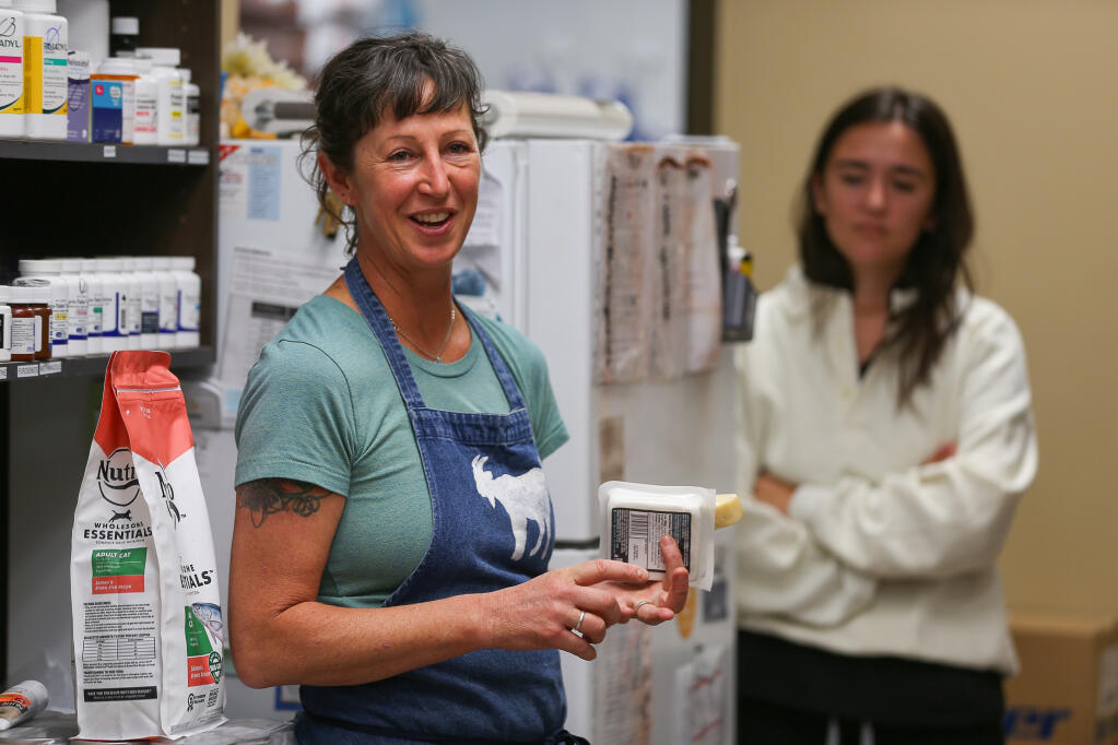 Deborah Blum, of Goatlandia Farm Animal Sanctuary and Goatlandia Kitchen, talks with the staff at Wine Country Veterinary Hospital before serving them a free lunch in Windsor, Wednesday, Aug. 30, 2023. (Christopher Chung / The Press Democrat)