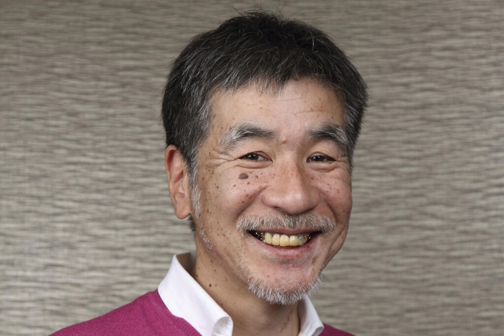 This undated photo provided by NIKOLI, shows Maki Kaji, chief executive of the company until July, 2021, in Tokyo, Japan.  Kaji, known as the “Godfather of Sudoku,” the numbers puzzle he created that’s drawn fans around the world, has died, a spokesman for his Japanese company said Tuesday, Aug. 17, 2021. He was 69. (NIKOLI via AP)