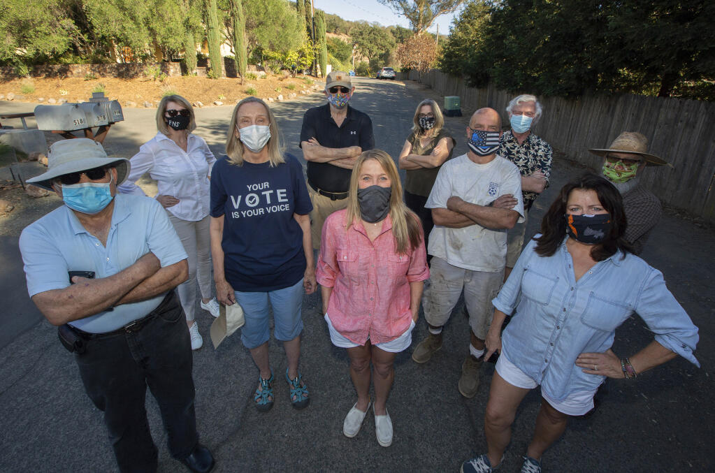 Steering committee of the Friends of North Sonoma gather at the end of Donald Street. From left: Gary Germano, Colleen Yudin Cowen, Maud Trachtenberg, Ricci Wheatley, Vicki DeSmet, Steve Caniglia, Paul Rockett, Camille Bosque, Tom Conlon.(Photo by Robbi Pengelly/Index-Tribune)