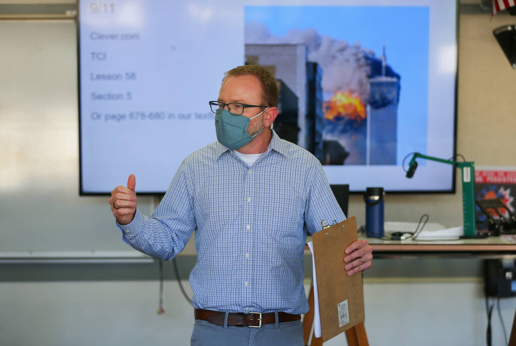 History teacher Thomas Warf leads a discussion about the terrorist attacks on Sept. 11, 2001, during his class at Healdsburg High School on Tuesday, Sept. 7, 2021. (Christopher Chung/ The Press Democrat)
