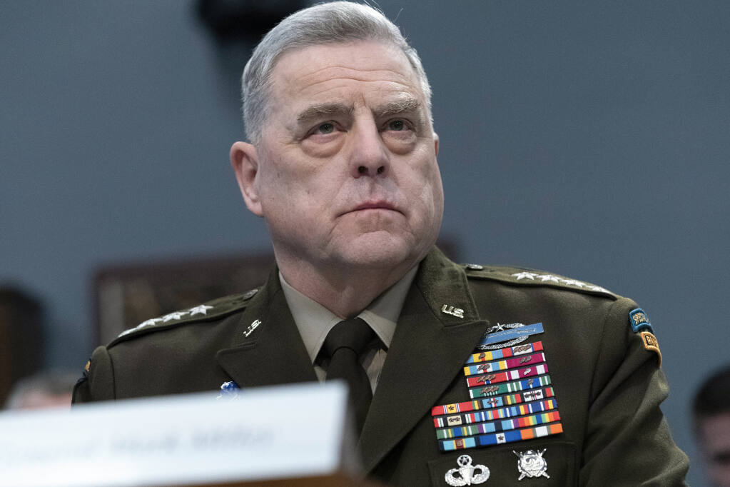 FILE - Chairman of the Joint Chiefs of Staff Gen. Mark Milley testifies before the House Committee on Appropriations Subcommittee on Defense during a hearing for the Fiscal Year 2023 Department of Defense, on Capitol Hill in Washington, May 11, 2022. In prepared remarks, Milley painted a grim picture of a world that is becoming more unstable, with great powers intent on changing the global order. And he told graduating cadets at the U.S. Military Academy at West Point that they will bear the responsibility to make sure America is prepared. (AP Photo/Jose Luis Magana, File)