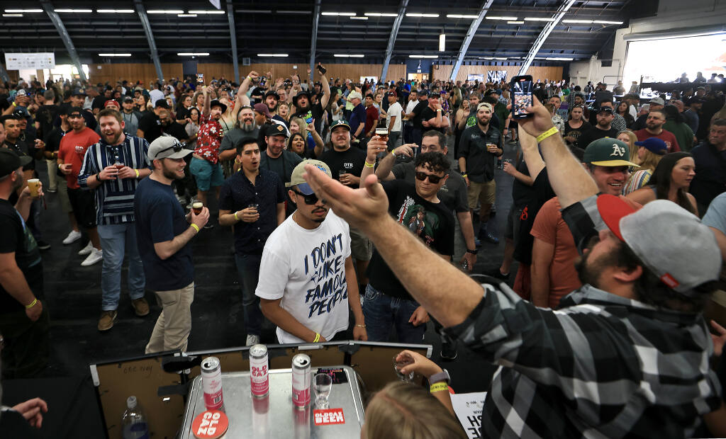 Beer on ice, Saturday, April 9, 2022 during the Battle of the Brews at the Sonoma County Fairgrounds in Santa Rosa. (Kent Porter / The Press Democrat) 2022