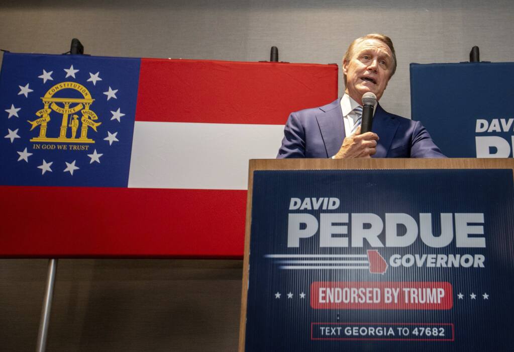 David Perdue concedes the primary Republican governor's race to Brian Kemp during his election party on Tuesday, May 24, 2022, in Atlanta. (Jenni Girtman/Atlanta Journal-Constitution via AP)