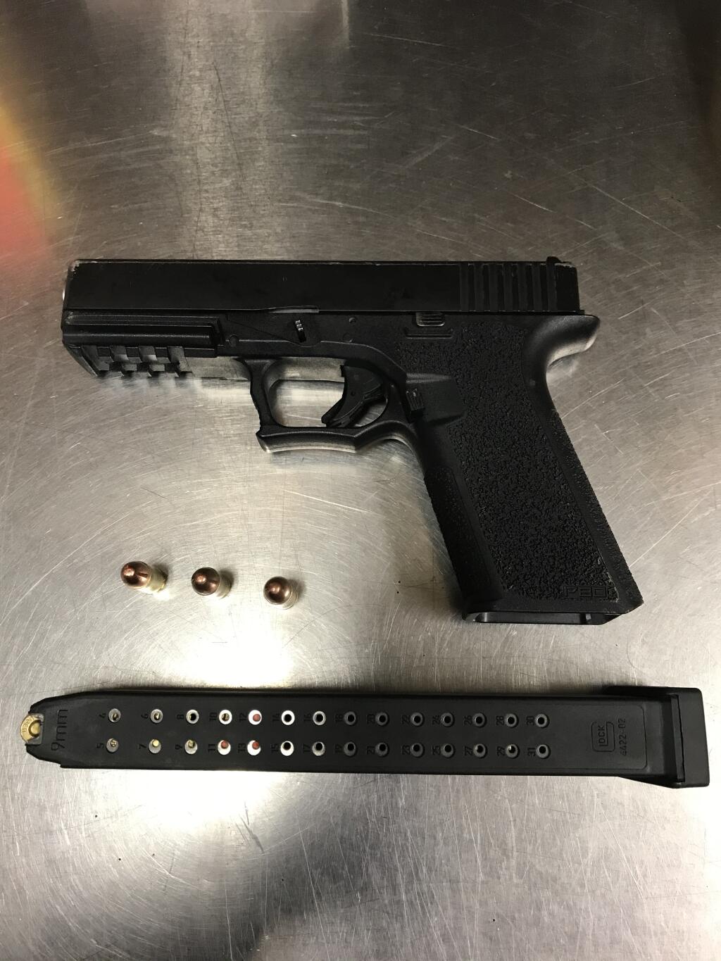 A handgun recovered by police in the shooting arrest of a 21-year-old Santa Rosa man suspected of illegally firing the weapon, which authorities say was unregistered. (Santa Rosa Police Department)