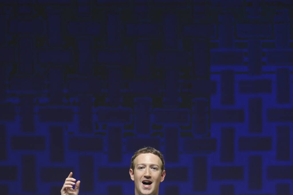 FILE – In this Nov. 19, 2016, file photo, Mark Zuckerberg, chairman and CEO of Facebook, speaks at the CEO summit during the annual Asia Pacific Economic Cooperation (APEC) forum in Lima, Peru. From complaints whistleblower Frances Haugen has filed with the SEC, along with redacted internal documents obtained by The Associated Press, the picture of the mighty Facebook that emerges is of a troubled, internally conflicted company, where data on the harms it causes is abundant, but solutions are halting at best. (AP Photo/Esteban Felix, File)