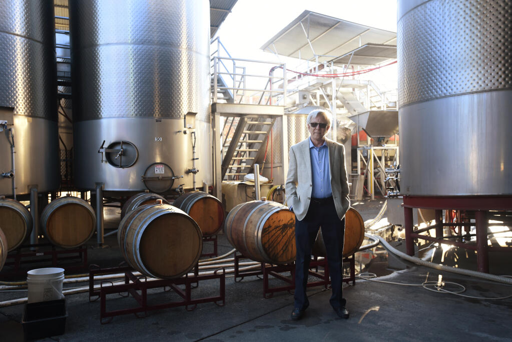 Pat Roney, 65, founder and CEO of Vintage Wine Estates, which now fully owns Kunde Family Winery, in the wine production area in Kenwood on Tuesday, Nov. 30, 2021. (Erik Castro/for The Press Democrat)