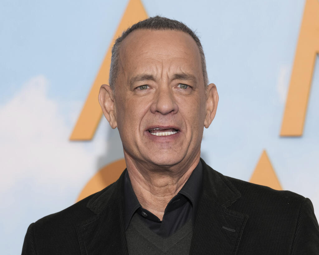 Tom Hanks poses for photographers upon arrival for the photocall of the film “A Man Called Otto” in London, Friday, Dec. 16, 2022. (Photo by Scott Garfitt/Invision/AP)