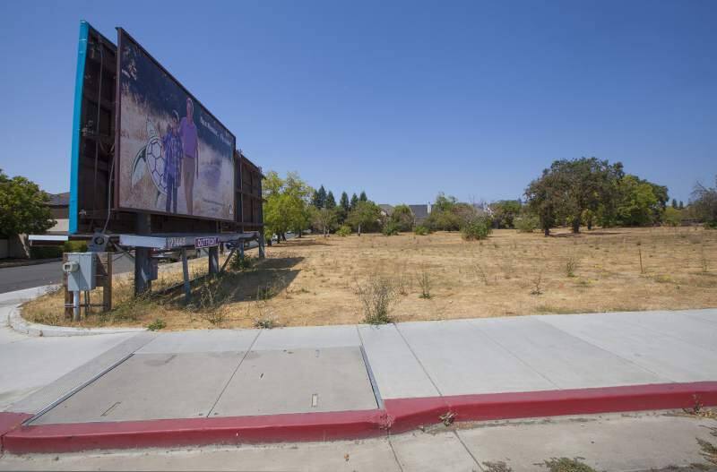 The 2-acre parcel at 20269 Broadway, pictured above last year, has been a vacant lot save for a couple of billboards since 2008.