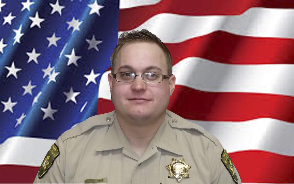 This undated photo provided by the Modoc County, Calif., Sheriff's Department shows Deputy Jack Hopkins. Hopkins, 31, was shot to death Wednesday, Oct. 19, 2016, while responding to a disturbance call, the Modoc County Sheriff's Office said. Deputies were responding to a call in a rural area about 10 miles south of Alturas, Calif., when deputy Hopkins, was fatally shot. A suspect was detained shortly after, the sheriff's office said. (Modoc County Sheriff's Department via AP)