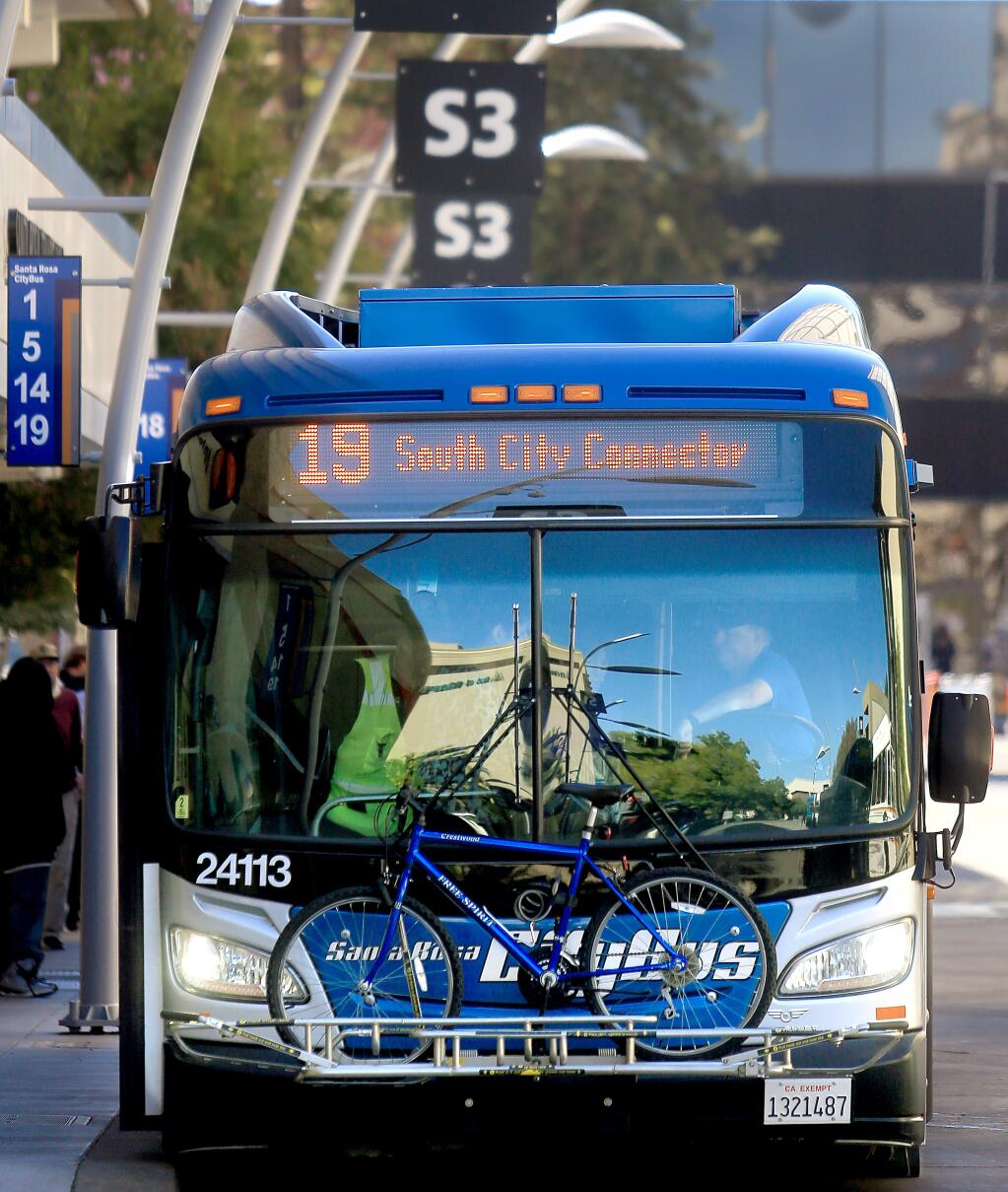 A driver waits for a connector bus to arrive at the Santa Rosa transit mall. The Santa Rosa City Council has approved ad rates for the city's new transit advertising program. (Kent Porter / The Press Democrat, 2017)