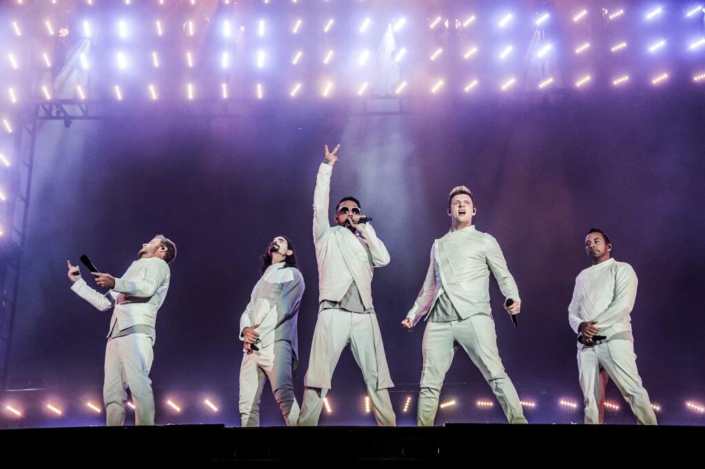 FILE - In this July 9, 2017, file photo, Brian Littrell, from left, Kevin Richardson, AJ McLean, Nick Carter and Howie Dorough of the Backstreet Boys perform during the Festival d'ete de Quebec in Quebec City, Canada. The Backstreet Boys have a new single. They released “Don't Go Break My Heart” on Thursday, May 17, 2018, along with a video. (Photo by Amy Harris/Invision/AP, File)