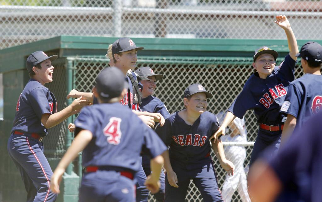The Bears celebrate Sunday after winning the 2018 Sonoma Little League City Championship. Youth interseted in honing their skills for next year's season can join the Don Lyon Skills Camp, Jan. 5-6 at Hughes Field. (Bill Hoban/Index-Tribune)