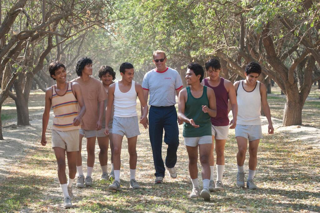 Kevin Costner, center, stars in 'McFarland, USA,' a sports drama film based on the true story of a 1987 cross country team from a predominantly Latino high school, McFarland High School, in McFarland, near Bakersfield. Costner plays the coach who leads the team through several local social issues to win a championship. (WALT DISNEY PICTURES)