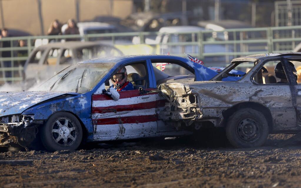 Drivers compete in the Destruction Derby at the Sonoma County Fair in Santa Rosa on Sunday, August 11, 2019. (BETH SCHLANKER/ The Press Democrat)