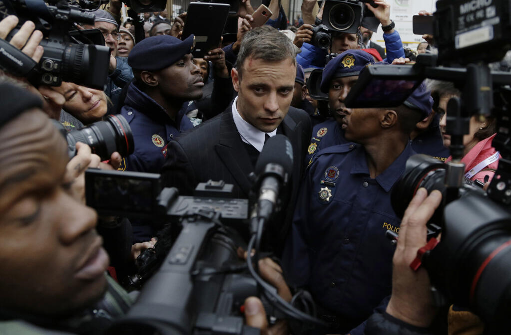 FILE - Oscar Pistorius leaves the High Court in Pretoria, South Africa, Tuesday June 14, 2016 during his trail for the murder of girlfriend Reeva Steenkamp. Pistorius has applied for parole and is expected to attend a hearing on Friday, March 31, 2023 that will decide if the former Olympic runner is released from prison 10 years after killing girlfriend Reeva Steenkamp. (AP Photo/Themba Hadebe, File)