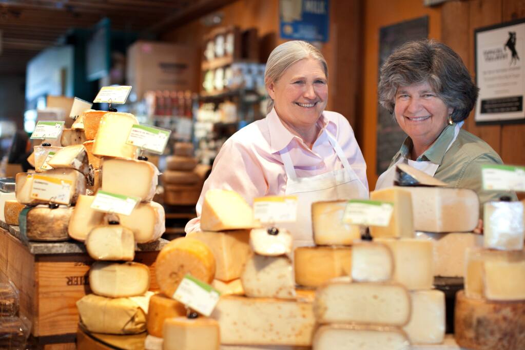 Cowgirl Creamery founders Peggy Smith and Sue Conley, seen here in 2011, plan to fully hand over the reins of the company to the new management team put in place in 2019, three years after the acquisition by Swiss dairy giant Emmi. (courtesy of Cowgirl Creamery)