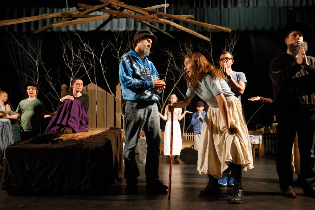 Analy senior Elijah Pinkham, center left, playing the role of Tevye, and sophomore Ella Shafer, center right, playing the role of Grandma Tzeitel, rehearse Tevyes nightmare scene for the Analy High School production of 'Fiddler on the Roof' directed by drama teacher Starr Hergenrather in Sebastopol, California on Wednesday, March 9, 2016. (Alvin Jornada / The Press Democrat)