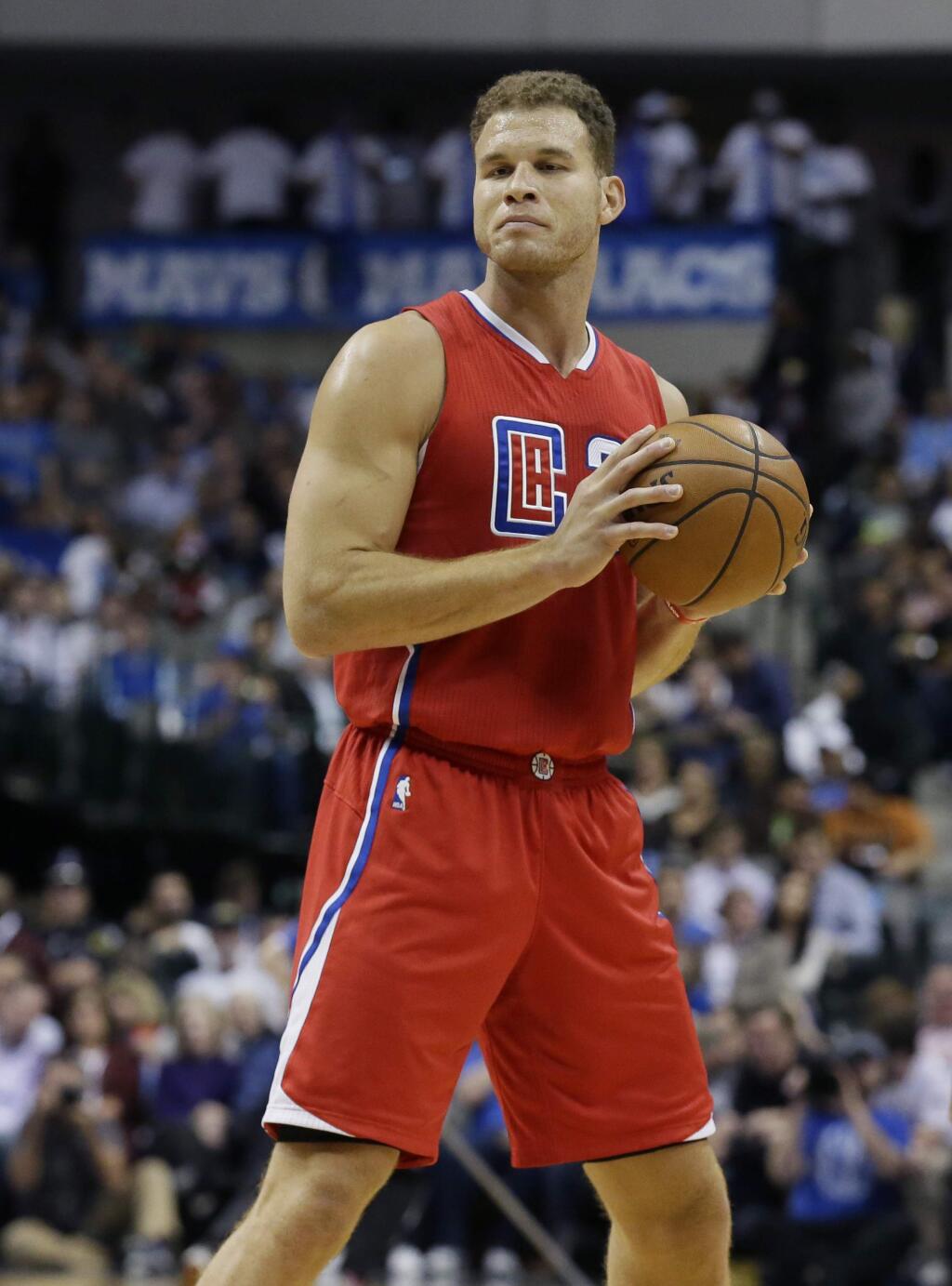 Los Angeles Clippers forward Blake Griffin (32) looks to pass during the first half of an NBA basketball game against the Dallas Mavericks Wednesday, Nov. 11, 2015, in Dallas. (AP Photo/LM Otero)