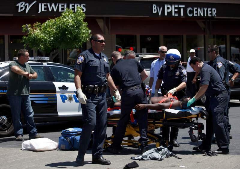 Emergency crews respond to a botched robbery attempt at the Bennett Valley Jewelers in 2014. (BETH SCHLANKER/ PD FILE)
