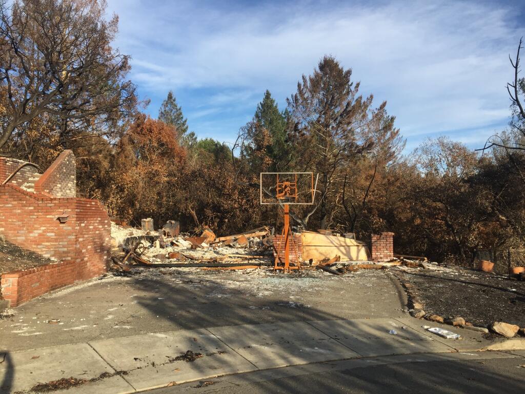 Almost all that remains of Tracy Condron’s home after the Tubbs Fire of 2017 was a basketball hoop. Photo by Tracy Condron