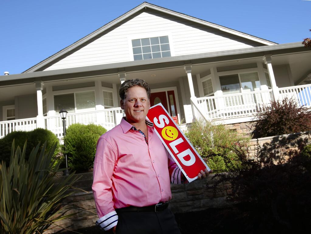 Jeff Schween of Pacific Union stands in front of a Fountaingrove home he sold in September. (Crista Jeremiason / The Press Democrat)