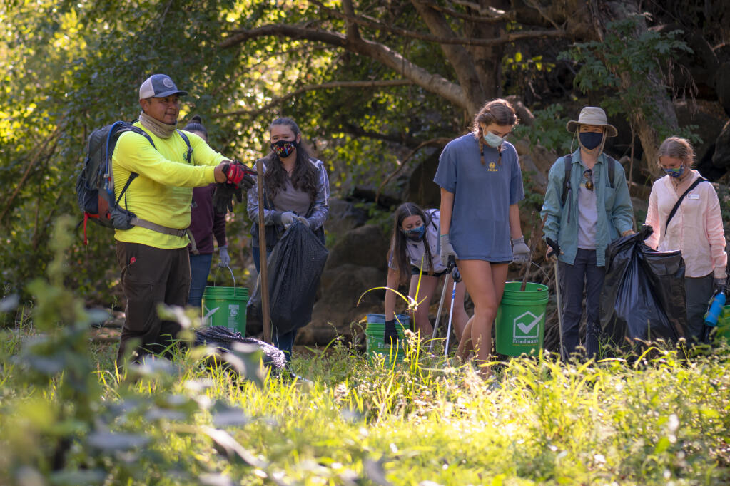 Sonoma Ecology Center’s teen EnviroAmbassadors and its restoration department were joined by community volunteers at Nathanson Creek for an event of California Coastal Clean-up month on Sept. 19. Photos by Kristen Russell.