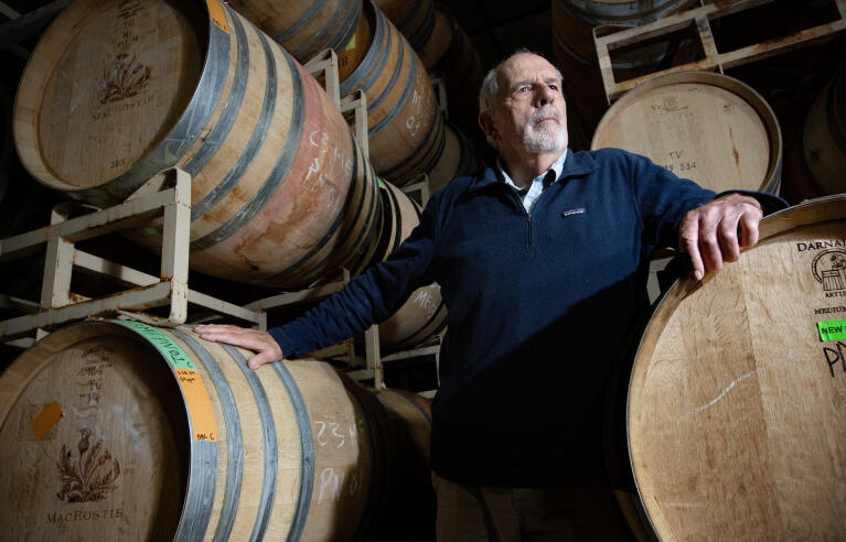 Winemaker Joseph Daniel in the barrel room of Magnolia Wine Services, a custom crush facility on Eighth Street East, where he is an alternate proprietor, operating his wine company, Tiny Vineyards. Photo taken on Wednesday, March 12, 2024. (Robbi Pengelly/Index-Tribune)