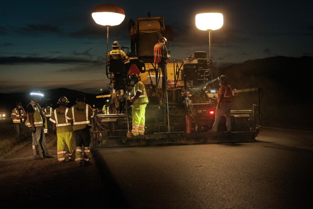 Caltrans crews begin working on the “Big Pave” adding new asphalt to the northbound lane on Highway 101 from Canyon Road in Geyserville, Calif., on Tuesday, April 28, 2020. (Photo: Erik Castro/for The Press Democrat)