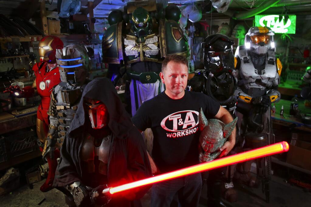 Photos by Christopher Chung/ The Press Democrat Shawn Thorsson handcrafts costumes of all kinds, many representing characters from movies, comics and videogames. He is shown in his workshop with Iron Man, left, Isaac Clarke (“Dead Space”), Sith Accolyte (“Star Wars: The Old Republic”), Space Marine (“Warhammer 40,000”), Tie Fighter Pilot (“Star Wars”) and Agent Washington (“Halo: Red vs. Blue”).