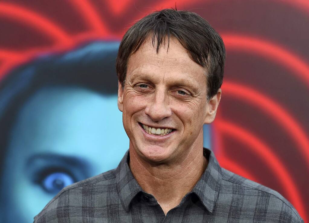 FILE - In this July 25, 2018 file photo, skateboarding legend Tony Hawk arrives at the world premiere of 'The Spy Who Dumped Me' in Los Angeles.  (Jordan Strauss / Invision)