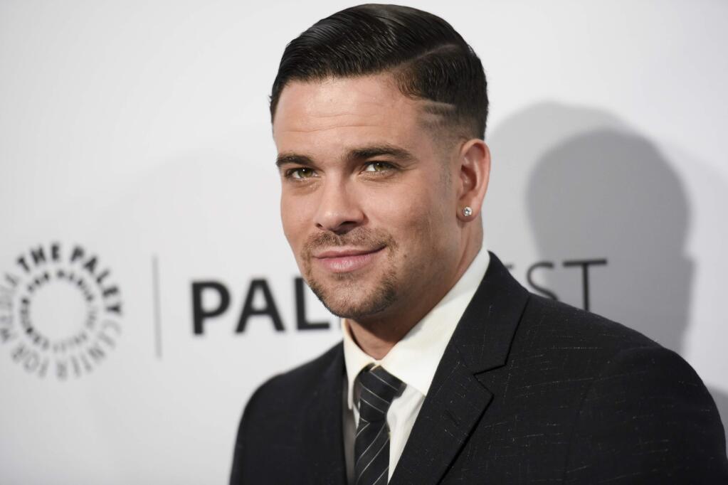 FILE - In this March 13, 2015 file photo, Mark Salling arrives at the 32nd annual Paleyfest 'Glee' in Los Angeles. Salling, one of the stars of the Fox musical comedy “Glee,” died, Tuesday Jan. 30, 2018. He was 35. Salling's lawyer, Michael J. Proctor did not release the cause of death. Salling pleaded guilty in December to possession of child pornography. (Photo by Richard Shotwell/Invision/AP, File)